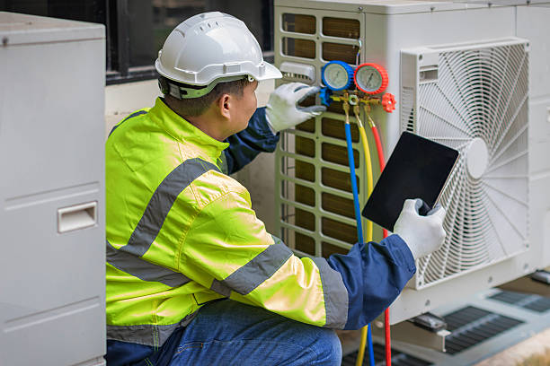 Professional Heat Pump Repair technician working in Caulfield, MO